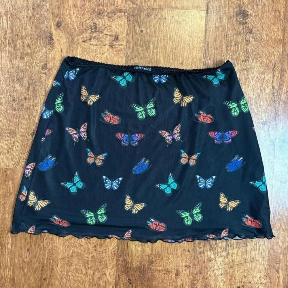 Black butterfly print skirt with lace trim and lettuce edge by Current Mood. Y2K